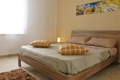 Letto o letti in una camera di Holiday Wish Siracusa