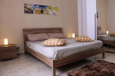 Letto o letti in una camera di Holiday Wish Siracusa