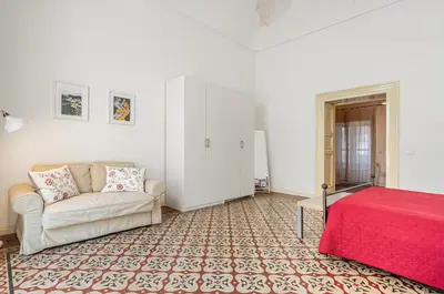 Area soggiorno di GuestHost - Urban Elegance by Sant'Agata - A Catania Gem