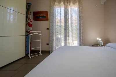 Letto o letti in una camera di Due Palme Apartment - SiciliaVacanza