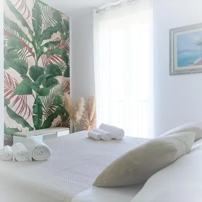 Letto o letti in una camera di IL MELOGRANO RESIDENCE MARZAMEMI