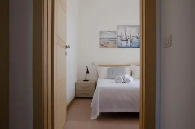 Letto o letti in una camera di San Lorenzo Blue Apartments - 150m from the Beach