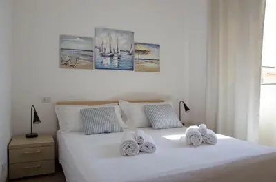 Letto o letti in una camera di San Lorenzo Blue Apartments - 150m from the Beach