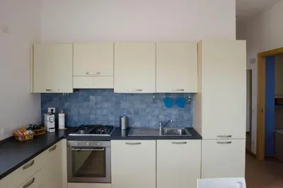 Cucina o angolo cottura di San Lorenzo Blue Apartments - 150m from the Beach