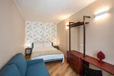 Letto o letti in una camera di Casa Marchesa