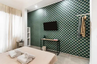 Letto o letti in una camera di Il Moro Rooms