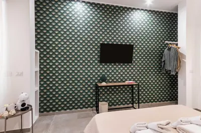 TV o dispositivi per l'intrattenimento presso Il Moro Rooms