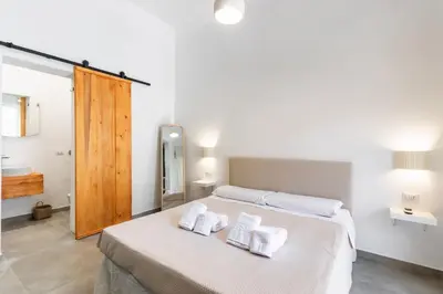 Letto o letti in una camera di Il Moro Rooms