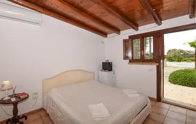 Letto o letti in una camera di Cozy Home In Siracusa With Kitchen