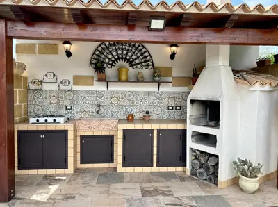 Cucina o angolo cottura di Lucrezia's house near the sandy beach parking-wifi