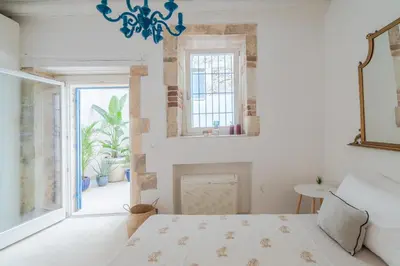 Letto o letti in una camera di Cortile Giudecca by Dimore in Sicily