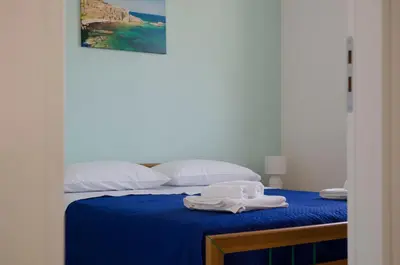 Letto o letti in una camera di Villa Giulia San Lorenzo Marzamemi