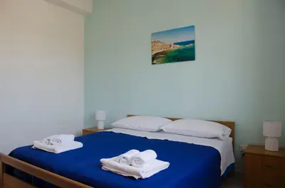 Letto o letti in una camera di Villa Giulia San Lorenzo Marzamemi