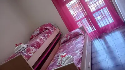 Letto o letti in una camera di Mama's House