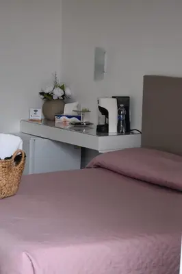 Letto o letti in una camera di Villa Sonia