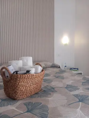 Letto o letti in una camera di Villa Sonia