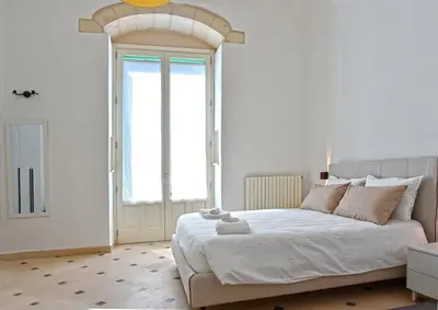 Letto o letti in una camera di Adhoc Rooms