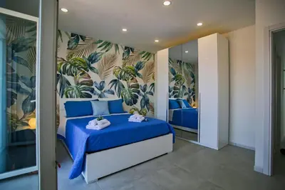 Letto o letti in una camera di Laudani Homes
