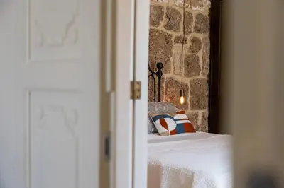 Letto o letti in una camera di Villa Edda
