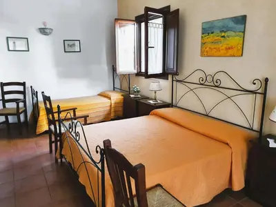 Letto o letti in una camera di Agriturismo Borgo Levante