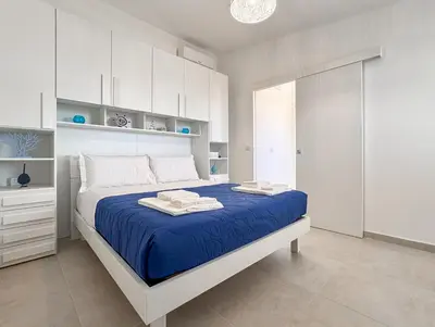 Letto o letti in una camera di Holiday Houses San Lorenzo