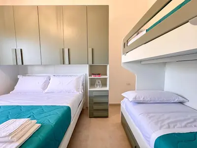 Letto o letti in una camera di Holiday Houses San Lorenzo