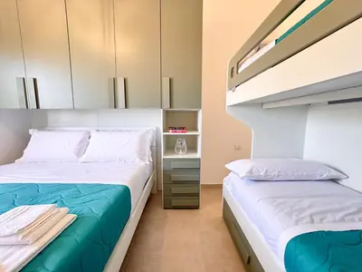 Letto o letti in una camera di Holiday Houses San Lorenzo
