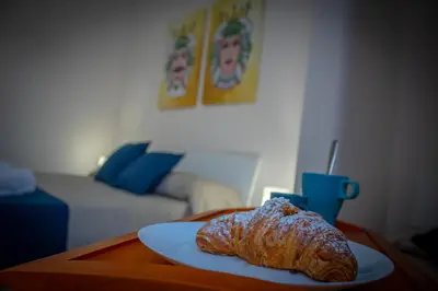 Letto o letti in una camera di San Giuliano Modern Suites