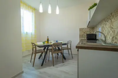 Cucina o angolo cottura di San Giuliano Modern Suites