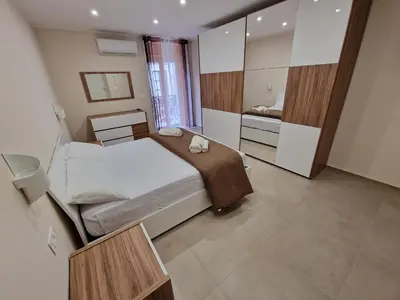 Letto o letti in una camera di A&G Apartment