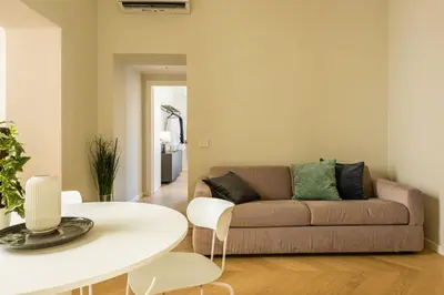 Area soggiorno di Palazzo Bozzanca Apartments by Wonderful Italy