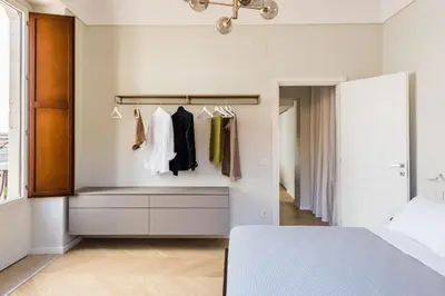 Letto o letti in una camera di Palazzo Bozzanca Apartments by Wonderful Italy