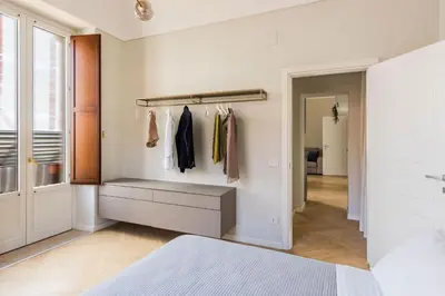 Letto o letti in una camera di Palazzo Bozzanca Apartments by Wonderful Italy
