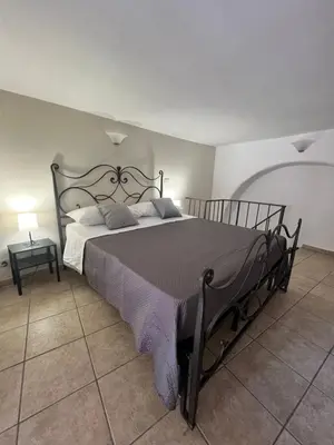 Letto o letti in una camera di Barcaioli's Home