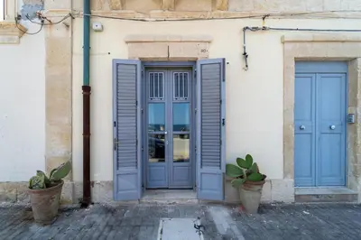 Facciata o entrata di GuestHost - La Stella di Levante - Ortigia Wonderful Apt