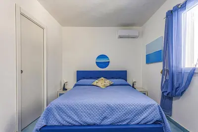 Letto o letti in una camera di Villa Mediterraneo by Villa Plus