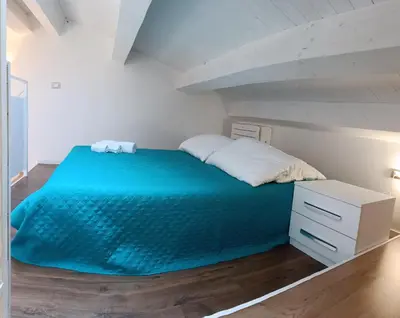Letto o letti in una camera di Casa Cianciolo