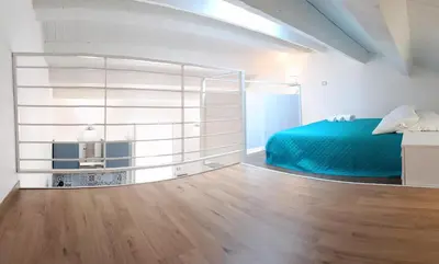 Letto o letti in una camera di Casa Cianciolo