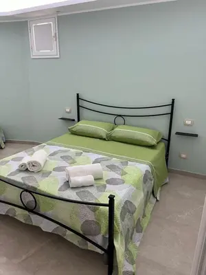 Letto o letti in una camera di Libeccio House