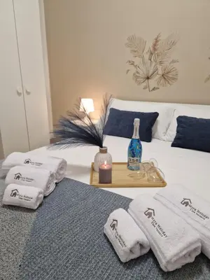 Letto o letti in una camera di MYRA Holiday