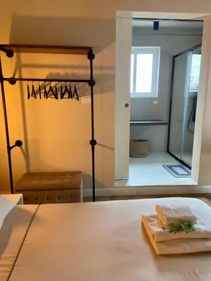 Letto o letti in una camera di Raisi Suites & Apartment