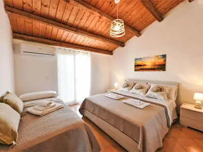 Letto o letti in una camera di Apartment MareLuna by Interhome