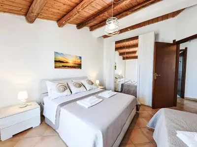 Letto o letti in una camera di Apartment MareLuna by Interhome