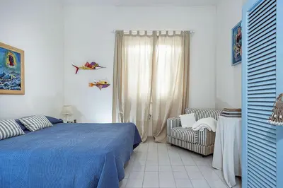 Letto o letti in una camera di Villa Mare Arabico