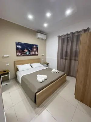Letto o letti in una camera di The Diamond of Catania Airport