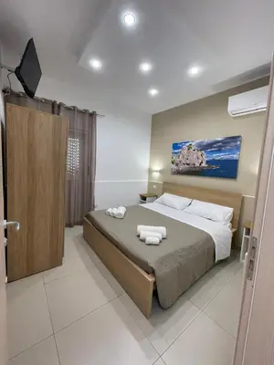 Letto o letti in una camera di The Diamond of Catania Airport