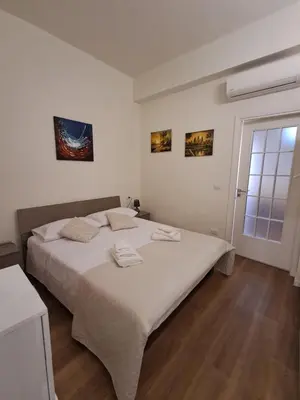 Letto o letti in una camera di Andromeda Apartment