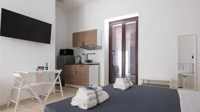 Letto o letti in una camera di Rosa Barocca