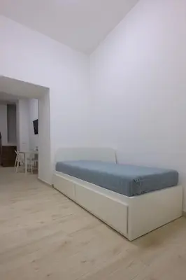 Letto o letti in una camera di Rosa Barocca