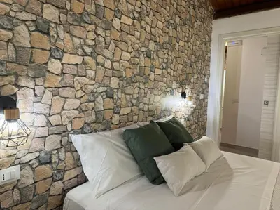 Letto o letti in una camera di Samuele s home